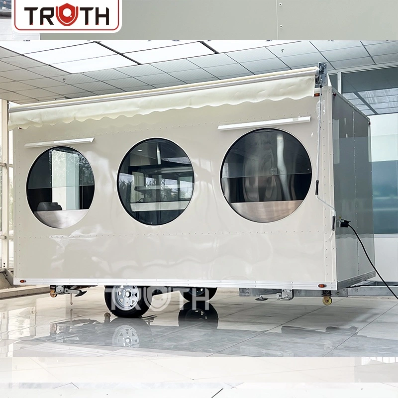 Custom food trailer front view with brand wrap design
